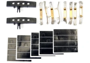 Produktbild von Carrera 20030802 Leitkiele Pro-X (2 Stück), Doppelschleifer (8 Stück) und Stickerbogen